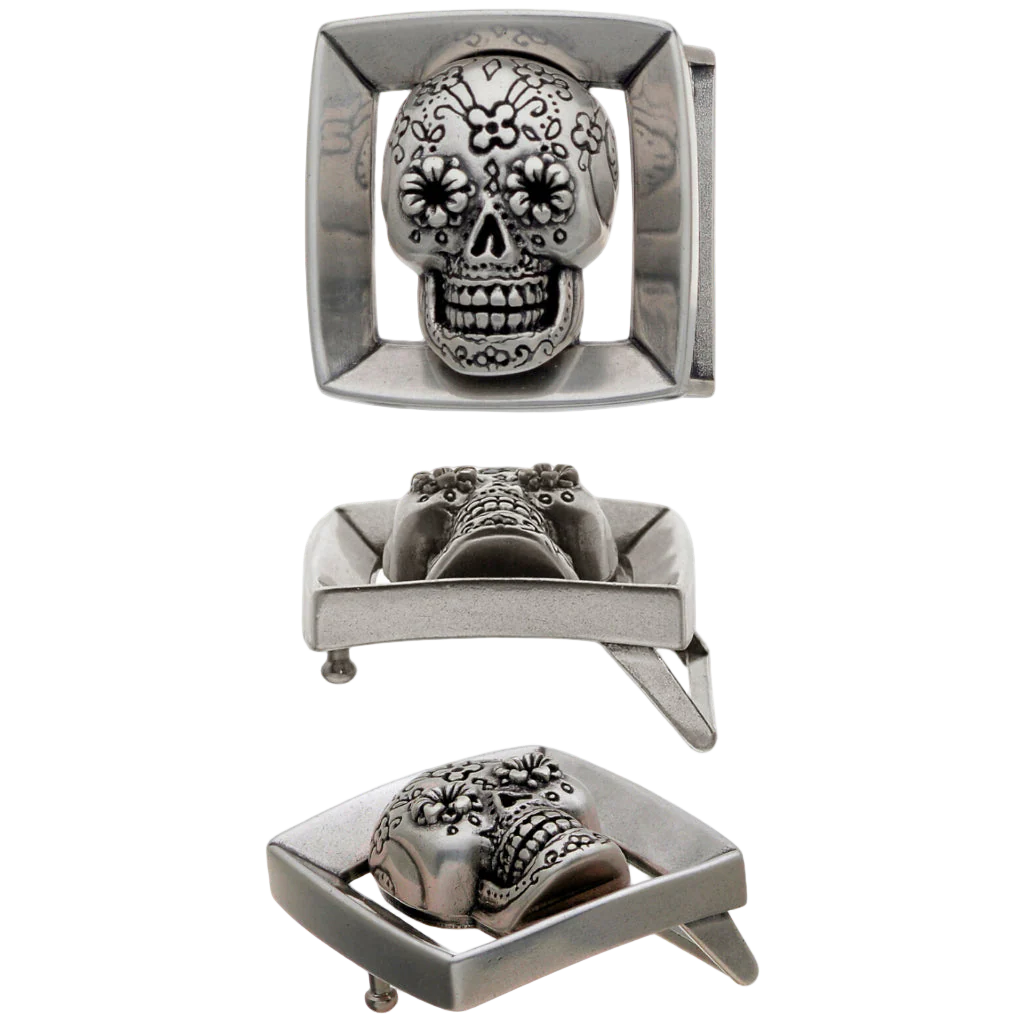 Silver belt buckle with skull design on a white background