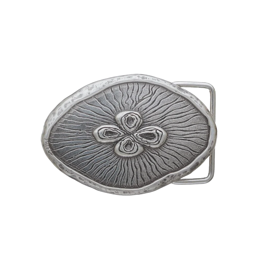 A detailed, sculpted silver belt buckle. This unique fashion accessory features an abstract, organic design with a central four-part pattern and radiating lines, with an artistic look that suggests a high-quality Italian design aesthetic.